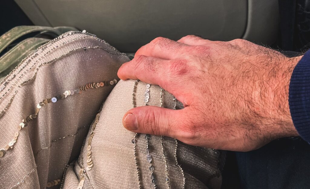 Jason's hand resting gently on me.